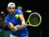 Matteo Berrettini (ITA) is in action during the 2024 Davis Cup Finals Group Stage Bologna match between Italy and Brazil at Unipol Arena in...