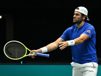 Matteo Berrettini (ITA) is in action during the 2024 Davis Cup Finals Group Stage Bologna match between Italy and Brazil at Unipol Arena in...