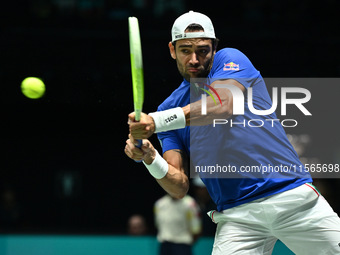 Matteo Berrettini (ITA) is in action during the 2024 Davis Cup Finals Group Stage Bologna match between Italy and Brazil at Unipol Arena in...