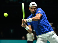 Matteo Berrettini (ITA) is in action during the 2024 Davis Cup Finals Group Stage Bologna match between Italy and Brazil at Unipol Arena in...