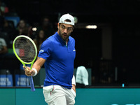 Matteo Berrettini (ITA) is in action during the 2024 Davis Cup Finals Group Stage Bologna match between Italy and Brazil at Unipol Arena in...