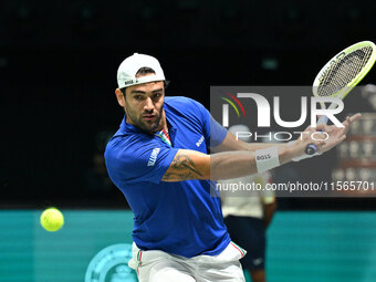 Matteo Berrettini (ITA) is in action during the 2024 Davis Cup Finals Group Stage Bologna match between Italy and Brazil at Unipol Arena in...