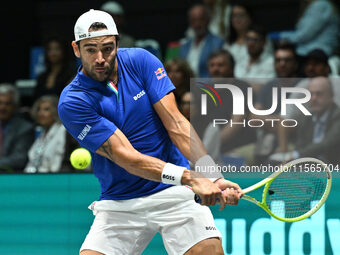 Matteo Berrettini (ITA) is in action during the 2024 Davis Cup Finals Group Stage Bologna match between Italy and Brazil at Unipol Arena in...