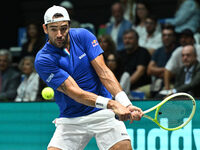 Matteo Berrettini (ITA) is in action during the 2024 Davis Cup Finals Group Stage Bologna match between Italy and Brazil at Unipol Arena in...