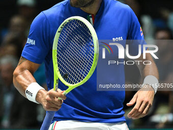 Matteo Berrettini (ITA) is in action during the 2024 Davis Cup Finals Group Stage Bologna match between Italy and Brazil at Unipol Arena in...