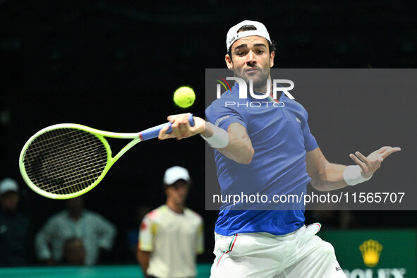 Matteo Berrettini (ITA) is in action during the 2024 Davis Cup Finals Group Stage Bologna match between Italy and Brazil at Unipol Arena in...