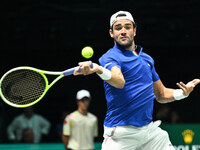 Matteo Berrettini (ITA) is in action during the 2024 Davis Cup Finals Group Stage Bologna match between Italy and Brazil at Unipol Arena in...