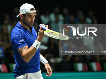 Matteo Berrettini (ITA) is in action during the 2024 Davis Cup Finals Group Stage Bologna match between Italy and Brazil at Unipol Arena in...