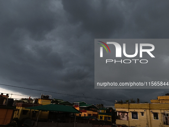 Dark rain clouds loom over the skyline in Siliguri, India, on September 11, 2024. (