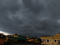 Dark rain clouds loom over the skyline in Siliguri, India, on September 11, 2024. (