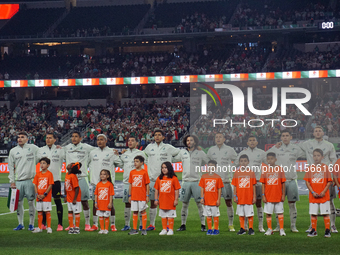 Team Mexico sings the Mexican national anthem before the international friendly match between Mexico and Canada at AT&T Stadium in Mexico Ci...