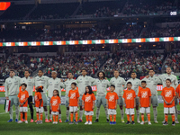 Team Mexico sings the Mexican national anthem before the international friendly match between Mexico and Canada at AT&T Stadium in Mexico Ci...