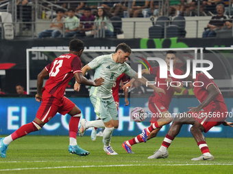 Santiago Gimenez #11 of Mexico drives the ball forward during the international friendly match between Mexico and Canada at AT&T Stadium in...