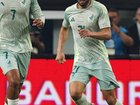 Cesar Huerta #21 of Mexico drives the ball forward during the international friendly match between Mexico and Canada at AT&T Stadium in Mexi...