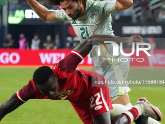 Cesar Huerta #21 of Mexico and Richie Laryea #22 of Canada battle for the ball during the international friendly match between Mexico and Ca...