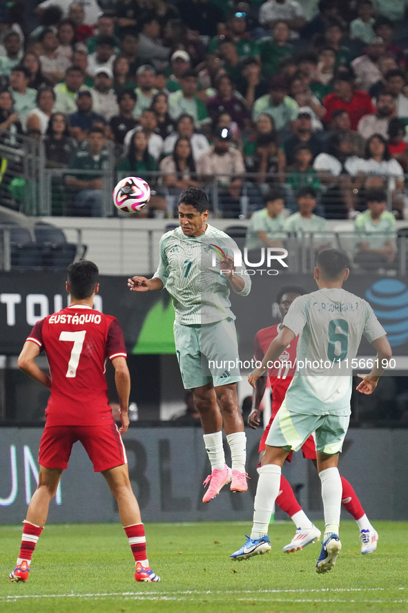 Luis Romo #7 of Mexico heads the ball during the international friendly match between Mexico and Canada at AT&T Stadium in Mexico City, Mexi...