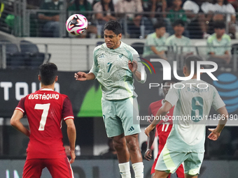 Luis Romo #7 of Mexico heads the ball during the international friendly match between Mexico and Canada at AT&T Stadium in Mexico City, Mexi...