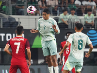 Luis Romo #7 of Mexico heads the ball during the international friendly match between Mexico and Canada at AT&T Stadium in Mexico City, Mexi...