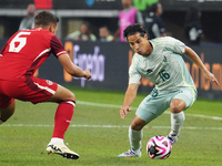 Diego Lainez #16 of Mexico drives the ball forward during the international friendly match between Mexico and Canada at AT&T Stadium in Mexi...