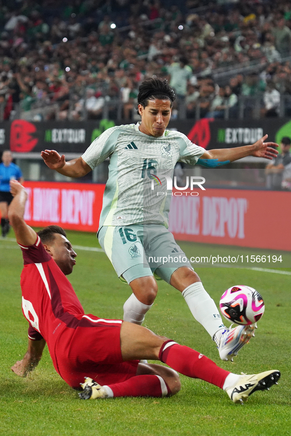 Diego Lainez #16 of Mexico drives the ball forward during the international friendly match between Mexico and Canada at AT&T Stadium in Mexi...