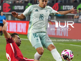 Diego Lainez #16 of Mexico drives the ball forward during the international friendly match between Mexico and Canada at AT&T Stadium in Mexi...