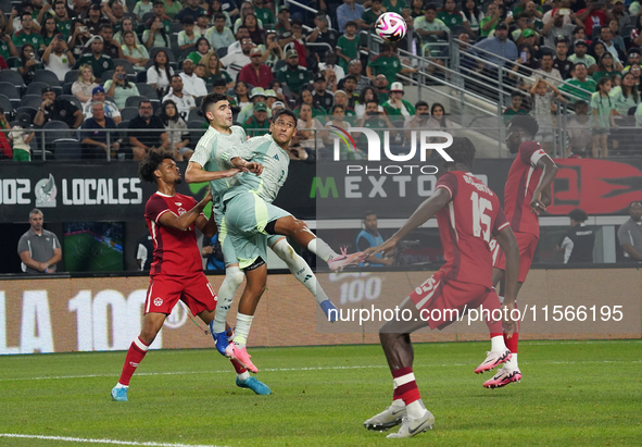 Luis Romo #7 of Mexico heads the ball during the international friendly match between Mexico and Canada at AT&T Stadium in Mexico City, Mexi...