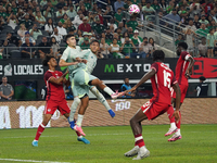 Luis Romo #7 of Mexico heads the ball during the international friendly match between Mexico and Canada at AT&T Stadium in Mexico City, Mexi...