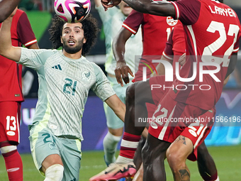 Cesar Huerta #21 of Mexico drives the ball forward during the international friendly match between Mexico and Canada at AT&T Stadium in Mexi...