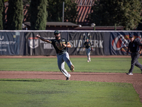 The Yolo High Wheelers (14) beat the Oakland Ballers (4) in game 1 (round 1) of the Pioneer Baseball League's playoffs in Davis, Calif., on...