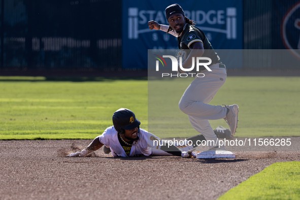 The Yolo High Wheelers (14) beat the Oakland Ballers (4) in game 1 (round 1) of the Pioneer Baseball League's playoffs in Davis, Calif., on...