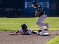 The Yolo High Wheelers (14) beat the Oakland Ballers (4) in game 1 (round 1) of the Pioneer Baseball League's playoffs in Davis, Calif., on...