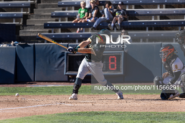 The Yolo High Wheelers (14) beat the Oakland Ballers (4) in game 1 (round 1) of the Pioneer Baseball League's playoffs in Davis, Calif., on...