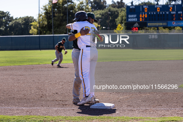 The Yolo High Wheelers (14) beat the Oakland Ballers (4) in game 1 (round 1) of the Pioneer Baseball League's playoffs in Davis, Calif., on...