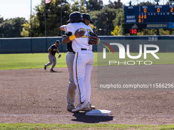 The Yolo High Wheelers (14) beat the Oakland Ballers (4) in game 1 (round 1) of the Pioneer Baseball League's playoffs in Davis, Calif., on...