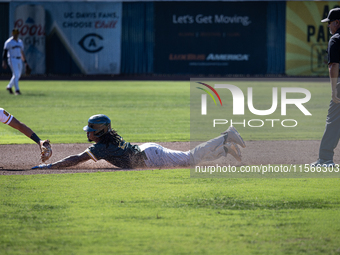 The Yolo High Wheelers (14) beat the Oakland Ballers (4) in game 1 (round 1) of the Pioneer Baseball League's playoffs in Davis, Calif., on...