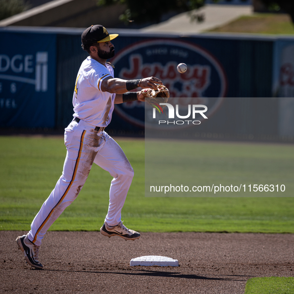 The Yolo High Wheelers (14) beat the Oakland Ballers (4) in game 1 (round 1) of the Pioneer Baseball League's playoffs in Davis, Calif., on...