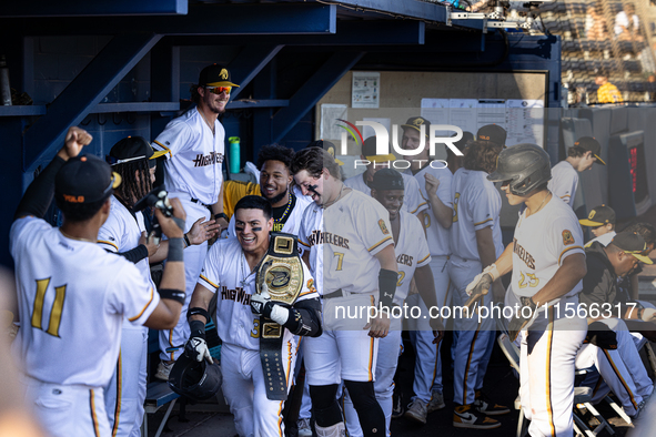 The Yolo High Wheelers (14) beat the Oakland Ballers (4) in game 1 (round 1) of the Pioneer Baseball League's playoffs in Davis, Calif., on...