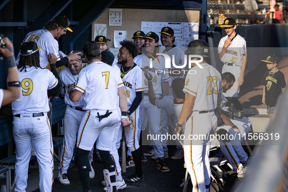 The Yolo High Wheelers (14) beat the Oakland Ballers (4) in game 1 (round 1) of the Pioneer Baseball League's playoffs in Davis, Calif., on...