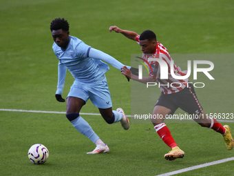 Elijah Izobodo of Athletic Club Bilbao challenges Jewison Bennette of Sunderland during the Premier League International Cup Group B match b...