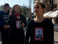 Members of the Cueca Sola collective perform an activity in front of the Palacio de La Moneda to commemorate the 51st anniversary of the Mil...