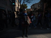 Members of the Cueca Sola collective perform an activity in front of the Palacio de La Moneda to commemorate the 51st anniversary of the Mil...