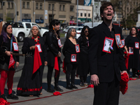 Members of the Cueca Sola collective perform an activity in front of the Palacio de La Moneda to commemorate the 51st anniversary of the Mil...