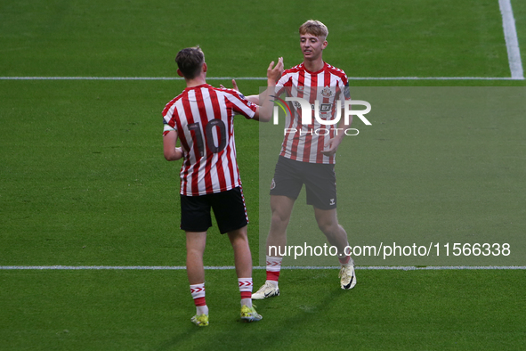 Sunderland's Harrison Jones celebrates his goal with Sunderland's Tom Watson during the Premier League International Cup Group B match betwe...