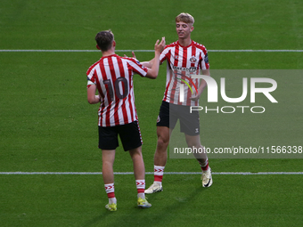 Sunderland's Harrison Jones celebrates his goal with Sunderland's Tom Watson during the Premier League International Cup Group B match betwe...