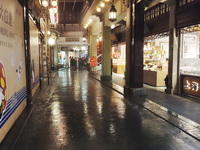 Tourists view the area amid heavy rain affected by a typhoon in Shanghai, China, on September 10, 2024. (