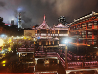 Tourists view the area amid heavy rain affected by a typhoon in Shanghai, China, on September 10, 2024. (