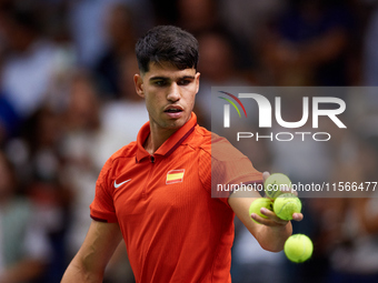 Carlos Alcaraz of Spain is in action during the game against Tomas Machac of Czechia during the 2024 Davis Cup Group B Stage match between C...