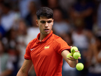 Carlos Alcaraz of Spain is in action during the game against Tomas Machac of Czechia during the 2024 Davis Cup Group B Stage match between C...