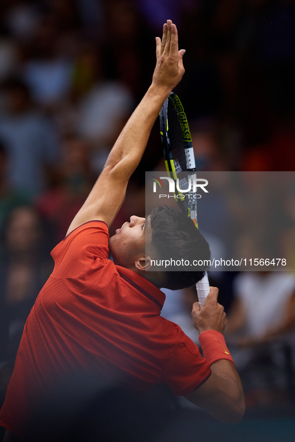 Carlos Alcaraz of Spain serves against Tomas Machac of Czechia during the 2024 Davis Cup Group B Stage match between Czechia and Spain at Pa...