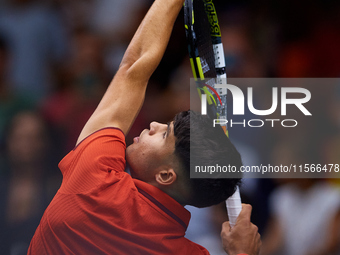 Carlos Alcaraz of Spain serves against Tomas Machac of Czechia during the 2024 Davis Cup Group B Stage match between Czechia and Spain at Pa...